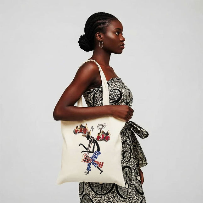 sac cabas tote bag artistique Le passeur de rythme par WO, illustration contemporaine inspirée du djembé, du voyage, de la transmission musicale et du mouvement.